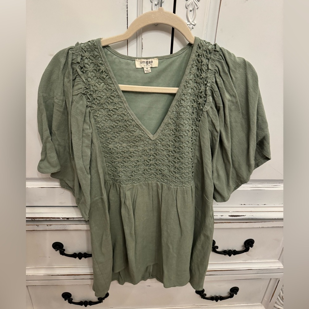 Women’s size medium green top